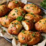 Delicious chicken bread appetizer with parsley garnish.