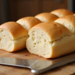 Freshly baked homemade sub bread loaves.