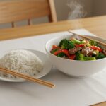 Easy beef and broccoli recipe: a finished plate of tender beef and vibrant broccoli, garnished and ready to serve.