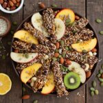 Stunning overhead presentation of the Supermodel Snack featuring fresh fruits and crunchy nuts, ideal for health-conscious snack lovers.