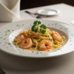 Delicious Marry Me Shrimp Pasta plated beautifully, showcasing creamy sauce and shrimp, perfect for a romantic dinner.