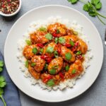 Final presentation of Sweet Chili Chicken, highlighting a colorful and flavorful dish ready to serve, perfect for dinner.