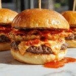 A close-up of a juicy cracked burger with a slightly charred sesame seed bun, overflowing with melted cheese, crisp lettuce, tomato slices, and crispy bacon. The burger is sliced open slightly to reveal tender beef patty, fresh toppings, and gooey cheese, all on a rustic wooden plate.